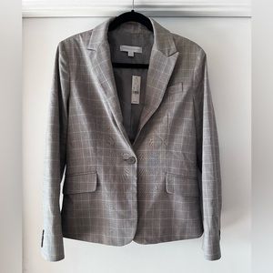 Women’s plaid jacket and high waist pencil skirt